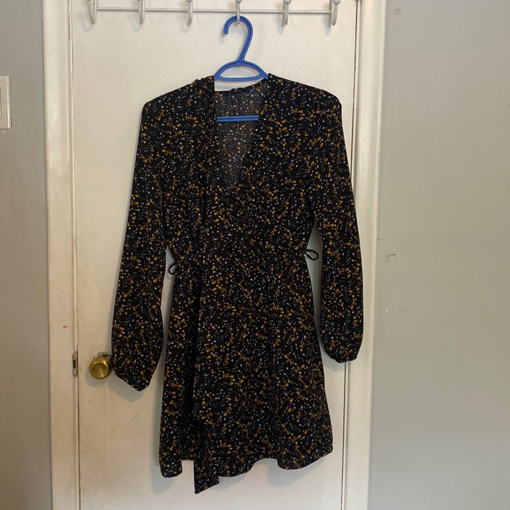 Black and gold mini dress